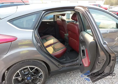 2012 Ford Focus Titanium z USA, uszkodzony, nr VIN 1FAHP3N28CL210557